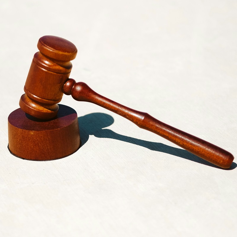 Courts could compel parties to participate in alternative dispute resolution (ADR), also called non-court dispute resolution - image of a gavel